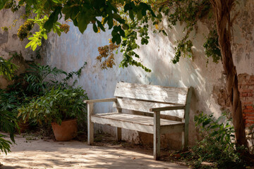 Obraz premium A serene old city courtyard featuring a rustic bench surrounded by lush plants and soft, muted colors. 