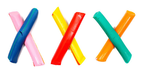 clay modelling in shape thrice x, colorful plasticine isolated on white
