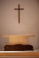 plinth inside simple stone church 