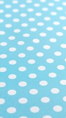 Close Up View Of White Polka Dots Patterned On A Powder Blue Background