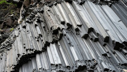 Detailed View Of Dark Grey Basalt Columns Formation With Natural Texture