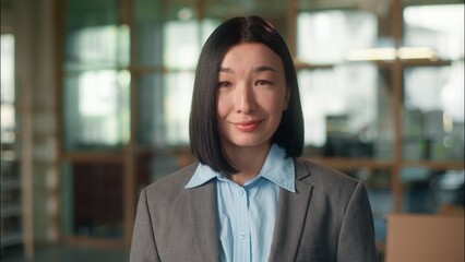 Smiling Asian woman business entrepreneur Chinese Korean girl businesswoman architect engineer...