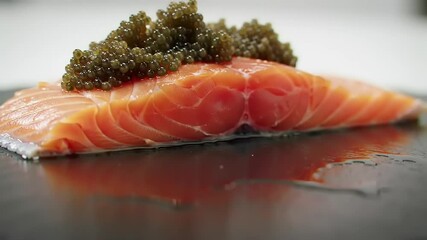 Salmon fillet with caviar with closeup.