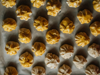 The process of making homemade cakes. A close-up shot of a lot of pies with different fillings on...