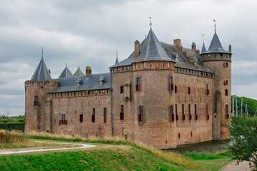 Muiderslot castle in North Holland, the Netherlands on a cloudy day.