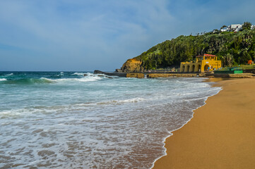 Thompsons bay beach, Picturesque sandy beach in a sheltered cove with a tidal pool in Shaka's Rock,...