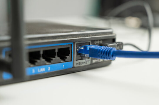 The internet cable is plugged into the router. 