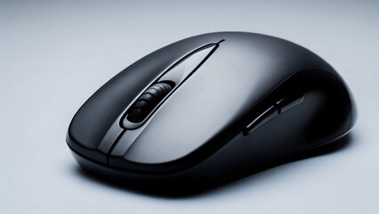 A close up of a sleek black computer mouse with a silver scroll wheel detail