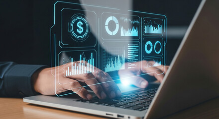 Person typing on laptop with digital financial data overlays and glowing light effect over keyboard