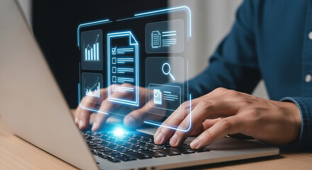 Person working on a laptop with digital interface showing charts and documents overlaying the screen