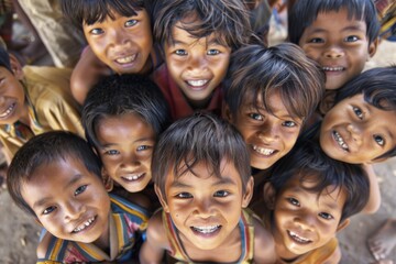 Group of happy kids smiling at camera in a group of children.