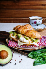 croissant abocado and eggs