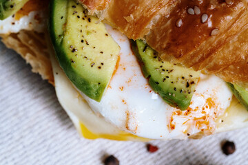 sandwich with eggs, abocado and pepper