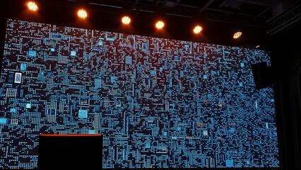 An abstract night business show in a technology hall features fiber optic cables screen and light spots