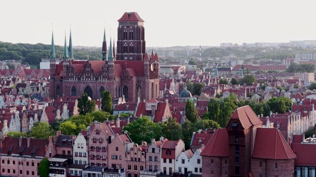 Aerial drone shot of Gdansk old town building panorama, view of the city skyline architecture, Poland. Slow motion