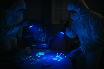 UV Evidence Sweep &mdash; Table of Glowing Prints