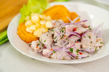 Peruvian ceviche with cancha and sweet potato, traditional dish from peru
