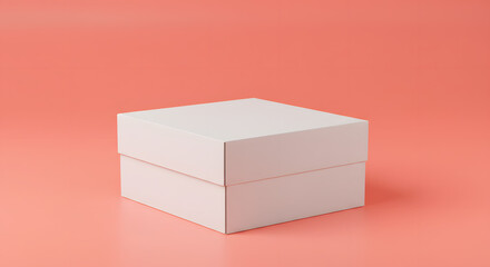 White cardboard box on coral pink