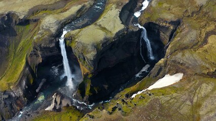 Aerial view of the spectacular pair of Haifoss waterfalls in southern Iceland. The waterfall  drops...