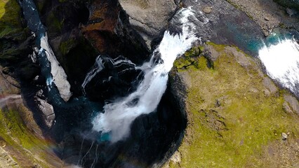 Aerial view of the spectacular Grannifoss waterfall and Fossaa River is a waterfall situated in...
