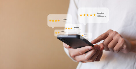 close up customer man hand hold smartphone to read comment on travel website and check survey...