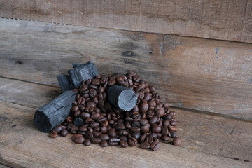 Coffee beans on a wooden background