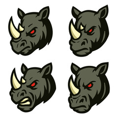Four stylized e-sport logo of rhinoceros head illustrations, showcasing different expressions of aggression and strength.