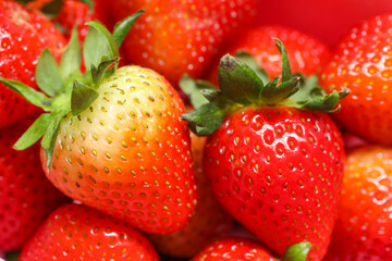 Close-up of ripe strawberries as background.