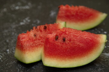 Tasty sliced watermelon on outdoors freshly sliced watermelon pieces arranged High quality photo...