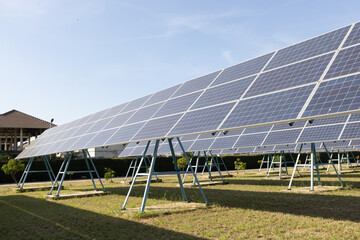 Blue solar panels on sky background. Solar power plant. Solar farm, Alternative source of...