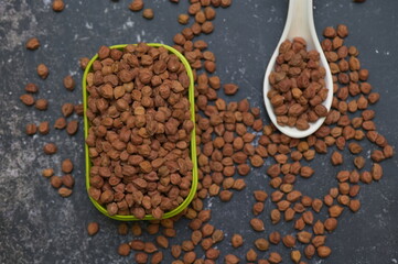 Raw chick peas, Chickpeas, Sundal also know as Chana Kondakadalai sundal closeup macro shot with cup.