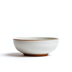 Minimalist ceramic bowl on a white background, showcasing its elegant design and subtle texture