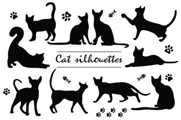 Silhouettes of nine cats with various poses fish skeletons and paw prints on a white background