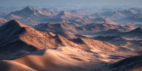 Naklejka premium Serene Desert Landscape at Sunrise Showcasing Rolling Sand Dunes and Mountainous Terrain in a Peaceful Natural Environment