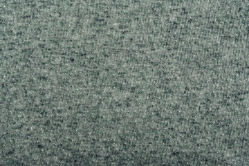 A close up of a gray and white fabric with a pattern of zig zags