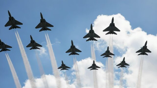 A group of fighter jets fly in formation against a cloudy sky