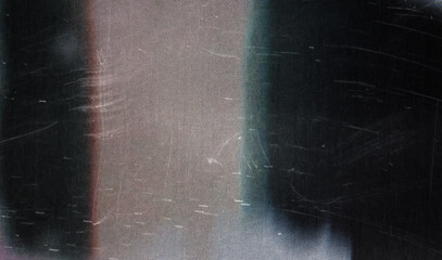 A textured, worn black surface with scratches and scuffs, offering a vintage and artistic appeal...