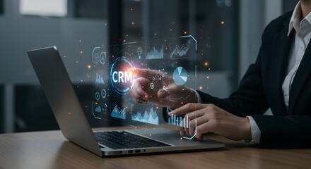 A businessperson interacting with a laptop showing data points related to crisis management and analysis.