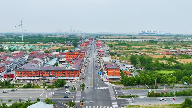 Binhai Port Town, Binhai County, Jiangsu Province, China &ndash; June 7, 2025: A daytime view of the main street in a coastal port town in eastern China.