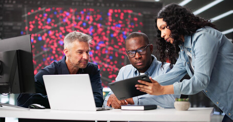 Diverse Cyber Security Team Monitoring Data