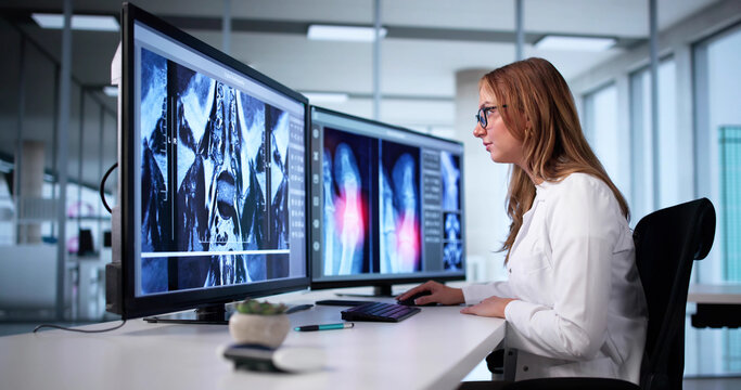 Skilled Female Doctor Examines X-ray Imaging