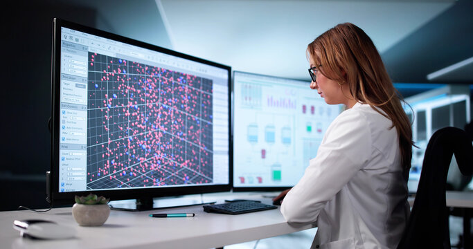 Female Scientist Examining Blood Samples With Computer Technology - Powered by Adobe