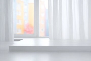 White table top on blurred pastel background of curtained window