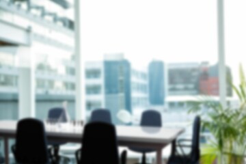 Flat design is showing wood conference table with swivel chairs and potted plant by windows