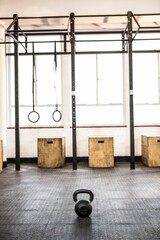 Minimalist gym illustration is featuring flat design pull-up rig, kettlebell, rings and plyo boxes