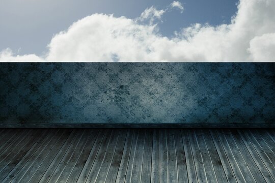 Fototapeta Cloudy sky beyond balcony