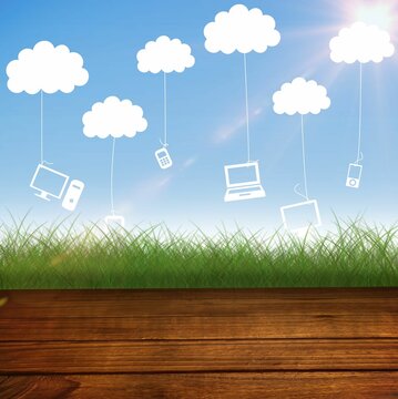 Fototapeta Flat design showing deck touching grass under blue sky, cloud icons tethering device silhouettes