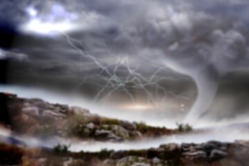 Landscape against cloudy sky during tornado