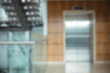 Defocused image of lift in modern office