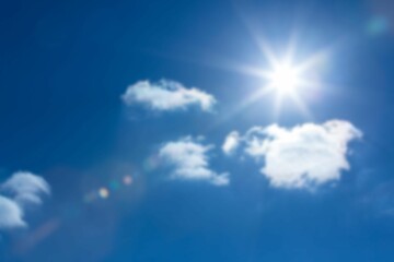 Low angle view of sky with bright sun